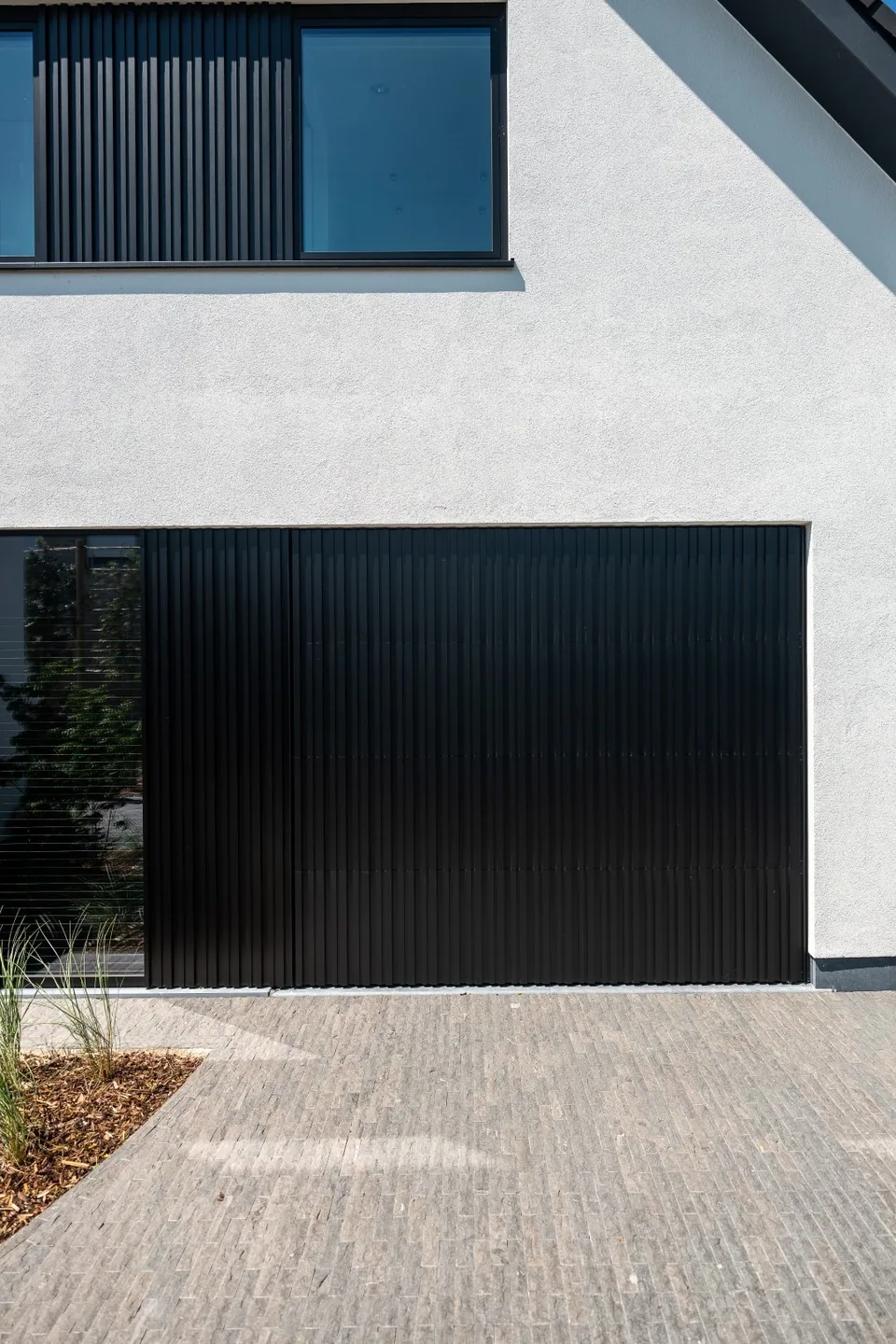 Nieuwbouwwoning met zwembad in De Haan – J.A.N Plus Architecten