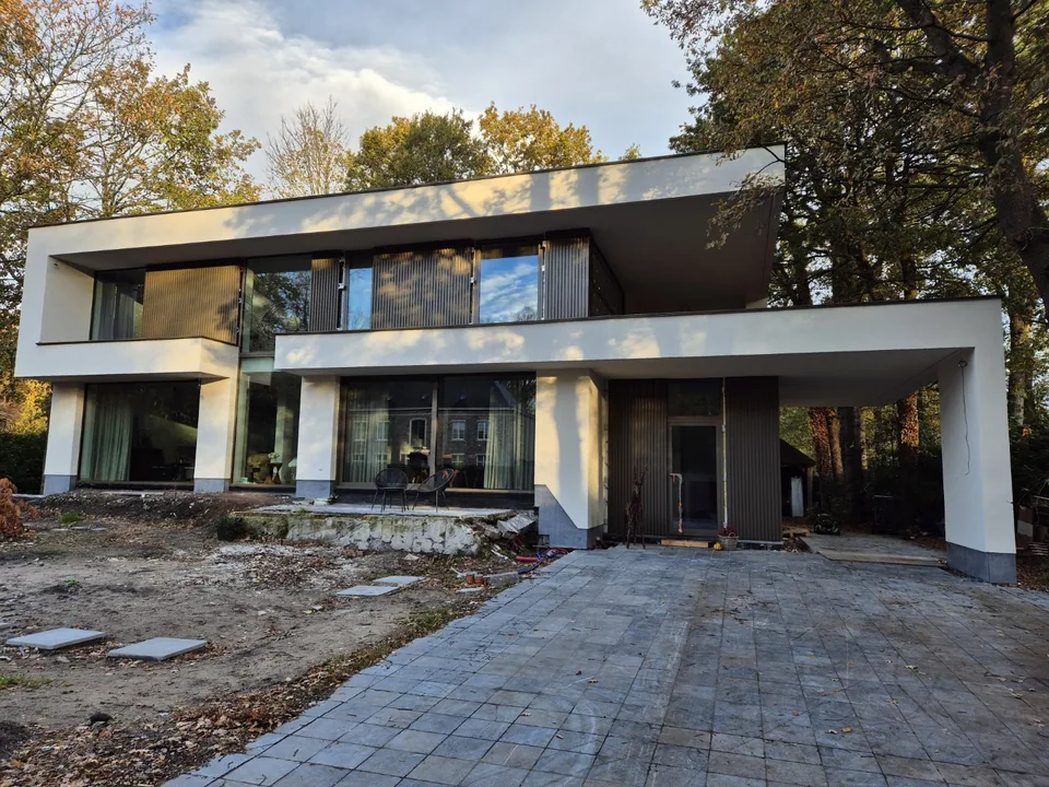 Verbouwing woning Sint-Kruis Brugge met zwembad – J.A.N Plus Architecten